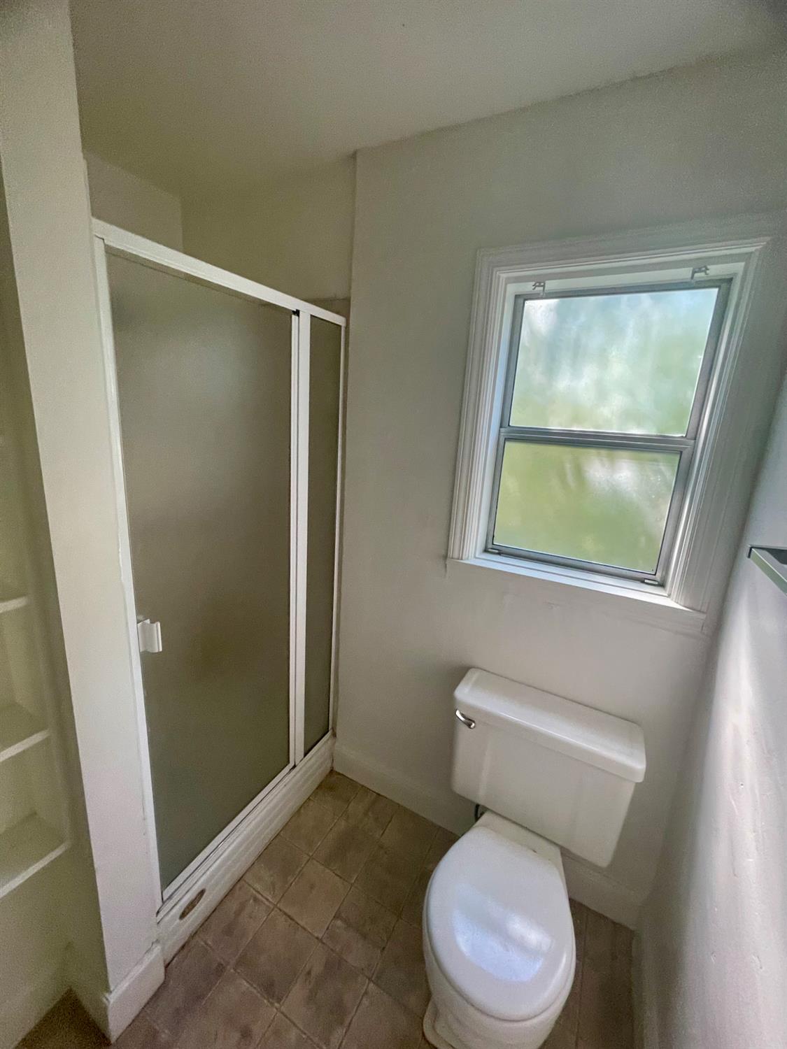 390 Nevada Street Gridley, CA 95948 - Photo 24 of 25 a white toilet sitting next to a bathroom sink