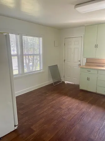 a room with window and bathroom