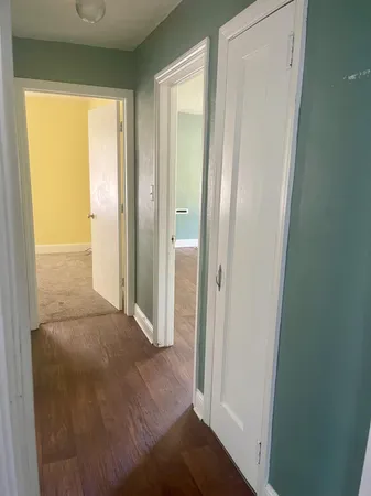 a view of entryway with wooden floor