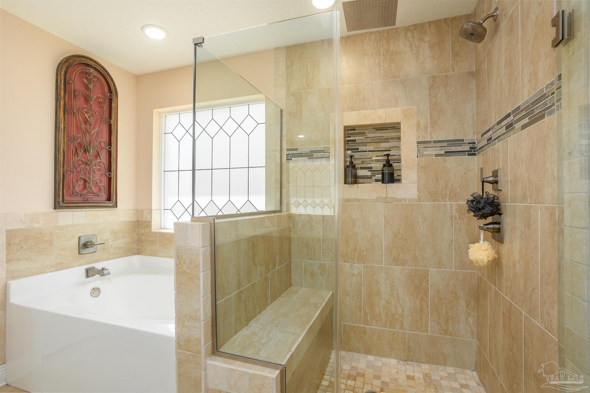 2383 Bud Diamond Road Jay, FL 32565 - Photo 20 of 50 a bathroom with a tub a sink and glass door shower