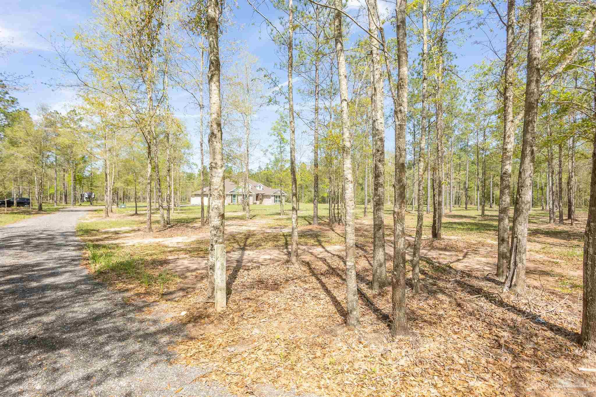 2383 Bud Diamond Road Jay, FL 32565 - Photo 42 of 50 a view of yard with wooden fence
