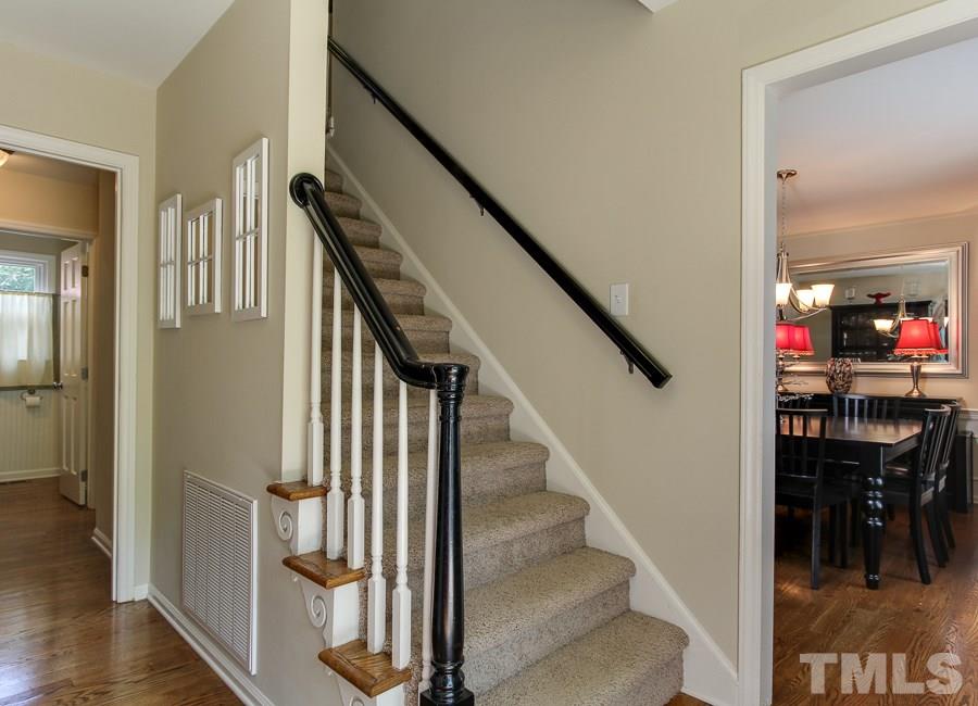 5305 Mapleridge Road Raleigh, NC 27609 - Photo 3 of 25 a view of entryway and hall with dining room