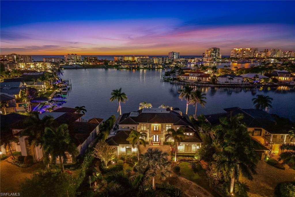 3125 Leeward Lane Naples, FL 34103 - Photo 29 of 30 a view of a lake in middle of the city