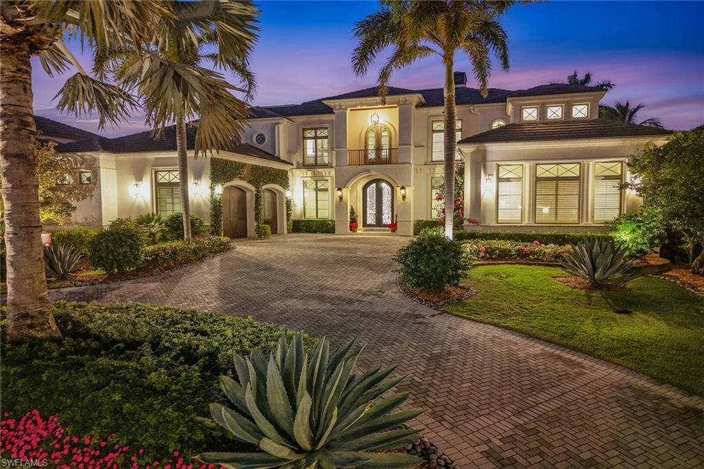 3125 Leeward Lane Naples, FL 34103 - Photo 30 of 30 a front view of a multi story residential apartment building