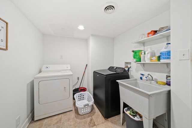 228 West Taylor Street DeKalb, IL 60115 - Photo 23 of 30 a utility room with dryer and washer