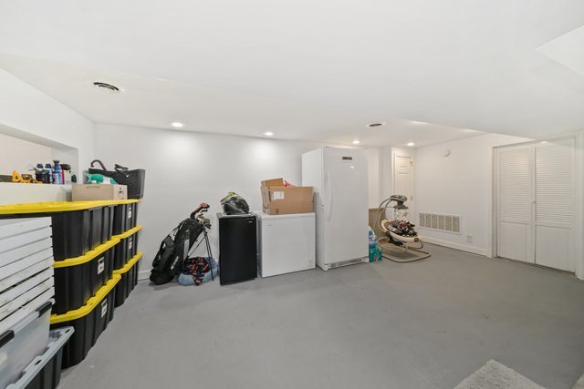 228 West Taylor Street DeKalb, IL 60115 - Photo 25 of 30 a view of a room with gym equipment