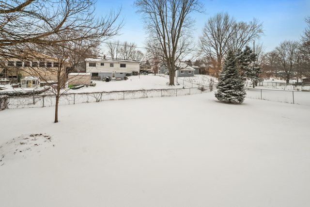 228 West Taylor Street DeKalb, IL 60115 - Photo 29 of 30 a view of snow on the road