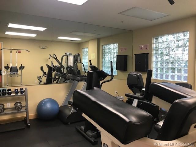 2630 Southwest 28th Street, Unit 26 Miami, FL 33133 - Photo 6 of 6 a view of a workspace with furniture and a window