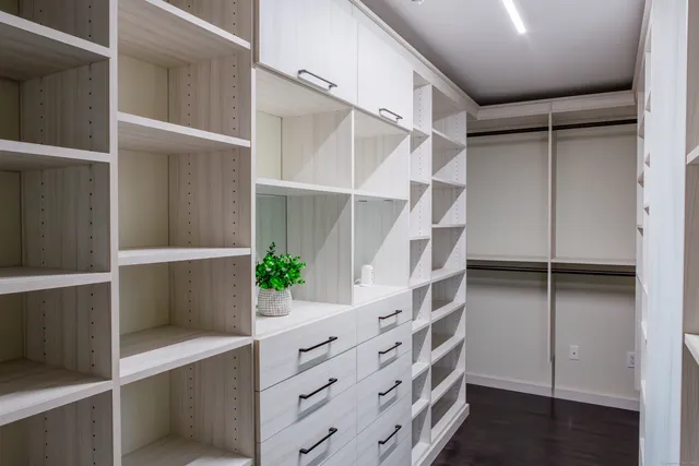 a view of an empty walk in closet