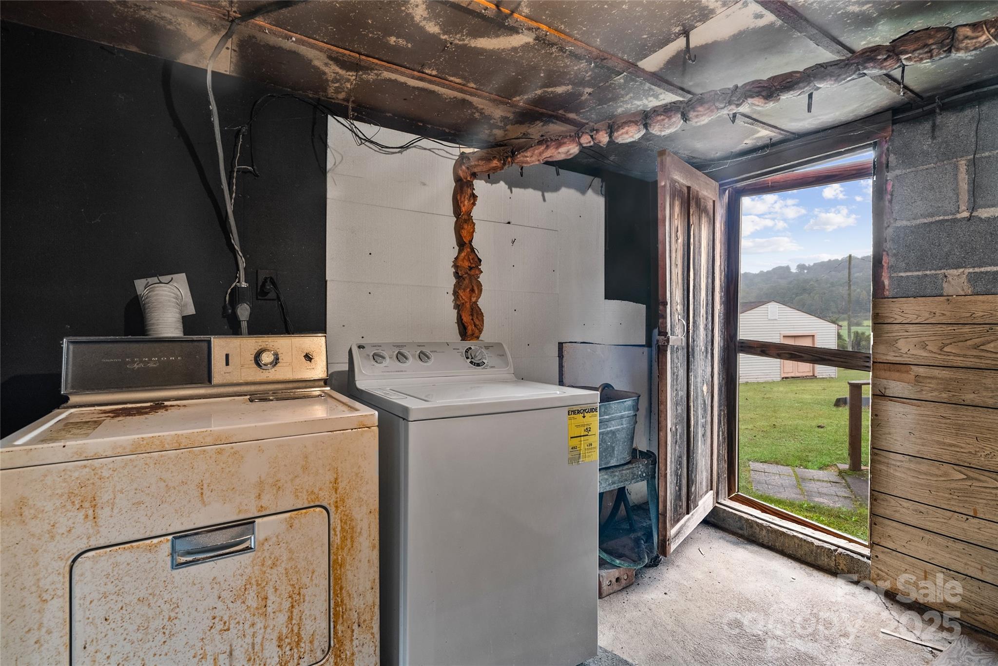 841 Elm Bend Road Brevard, NC 28712 - Photo 19 of 26 a utility room with dryer and washer