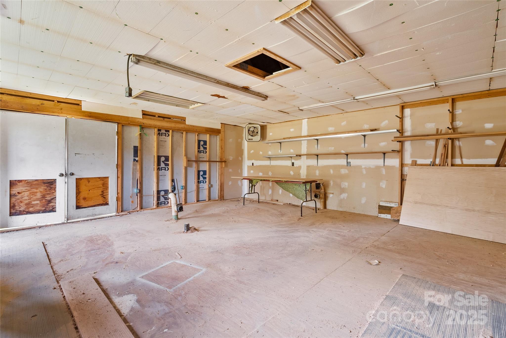 841 Elm Bend Road Brevard, NC 28712 - Photo 22 of 26 a view of a room with gym equipment