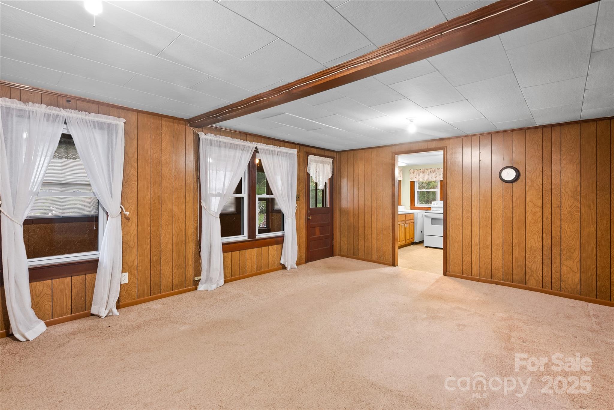 841 Elm Bend Road Brevard, NC 28712 - Photo 10 of 26 a view of an empty room with closet and a window