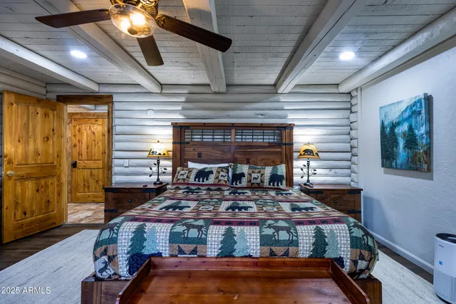 a bathroom with a sink a mirror and a shower