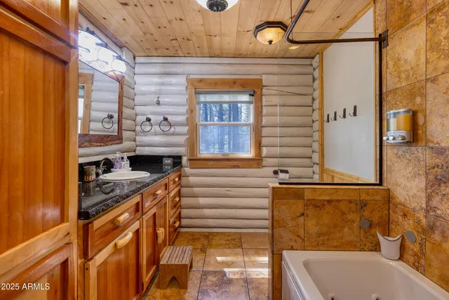 a bed room with a bed and a window