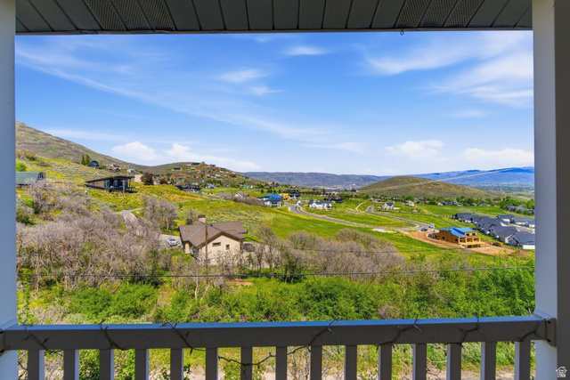 380 Luzern Road Midway, UT 84049 - Photo 2 of 74 Expansive hillside scenery featuring distant mountains and scattered residential properties