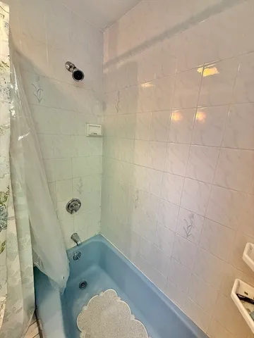 a bathroom with a sink and a tub