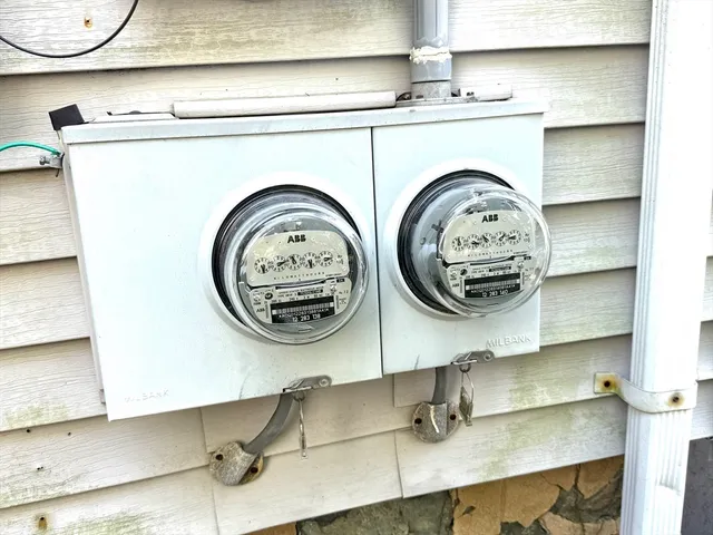 a view of a car park in front of a house
