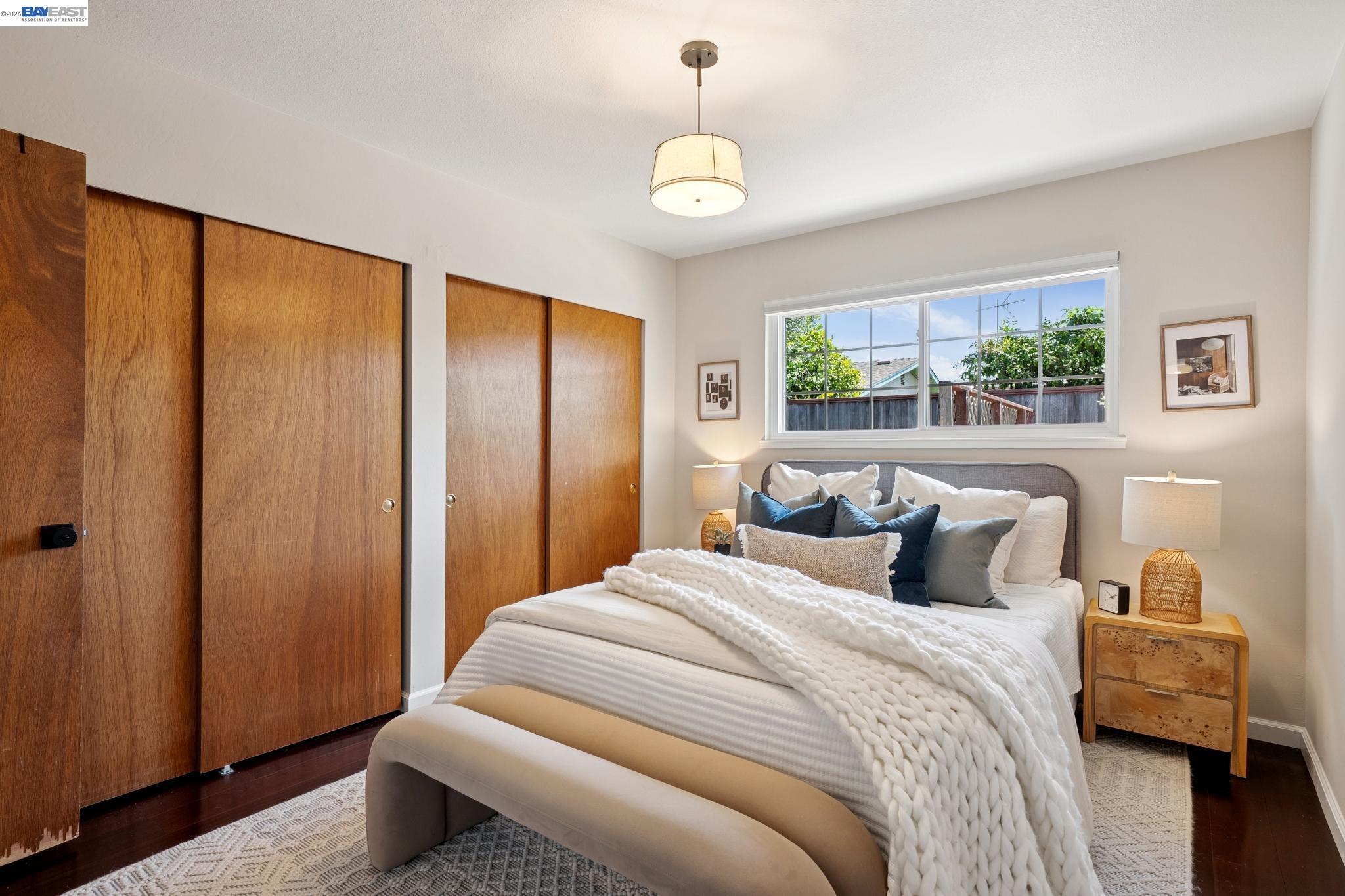 328 Sand Beach Road Alameda, CA 94501 - Photo 25 of 48 a bedroom with bed and a window