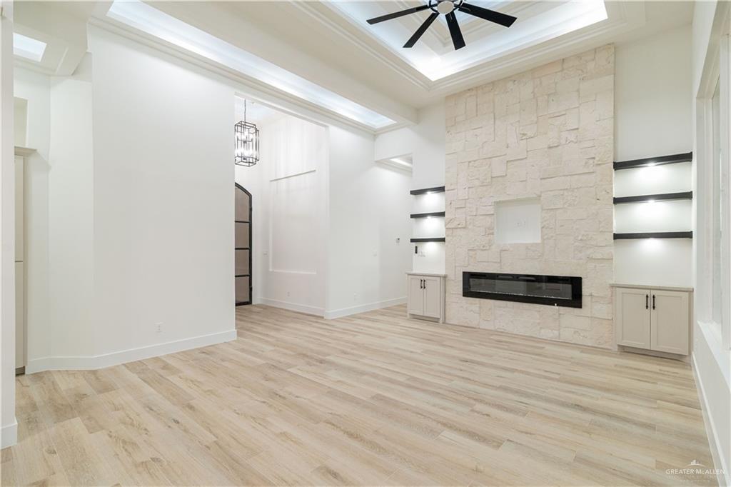 9804 North 25th Street McAllen, TX 78504 - Photo 3 of 18 wooden floor in an empty room