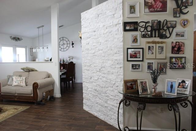 34321 South Haines Creek Road Leesburg, FL 34788 - Photo 3 of 19 a living room with furniture and furniture
