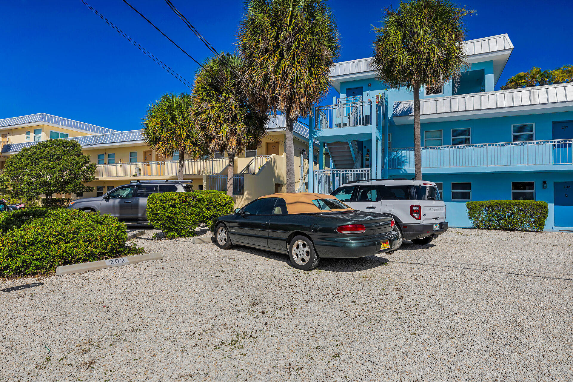 201 Coppitt Road, Unit 202C Key West, FL 33040 - Photo 22 of 31 a car parked in front of a house