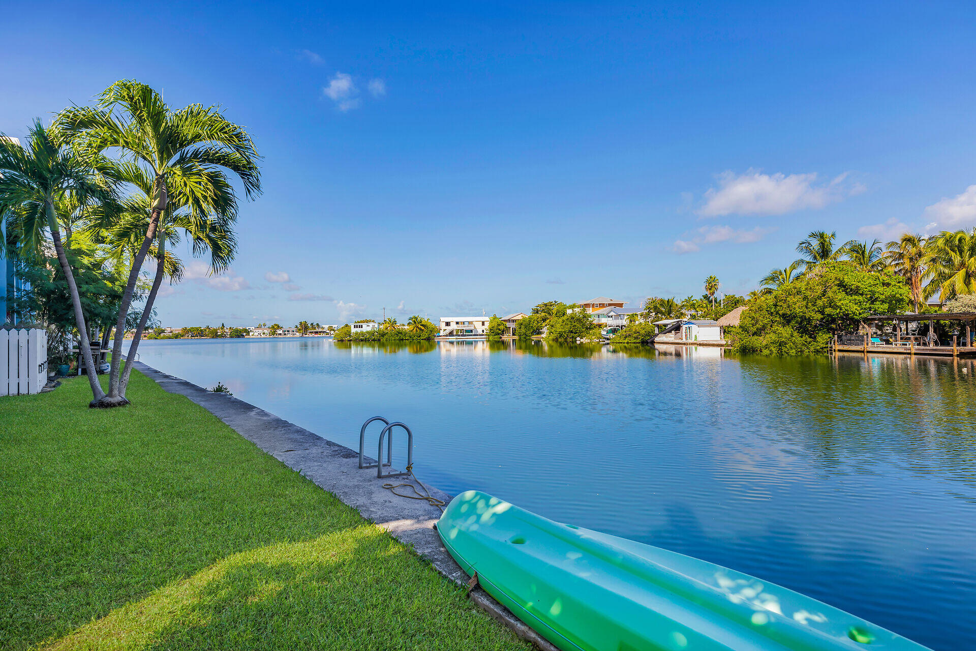 201 Coppitt Road, Unit 202C Key West, FL 33040 - Photo 24 of 31 a view of a lake with a big yard