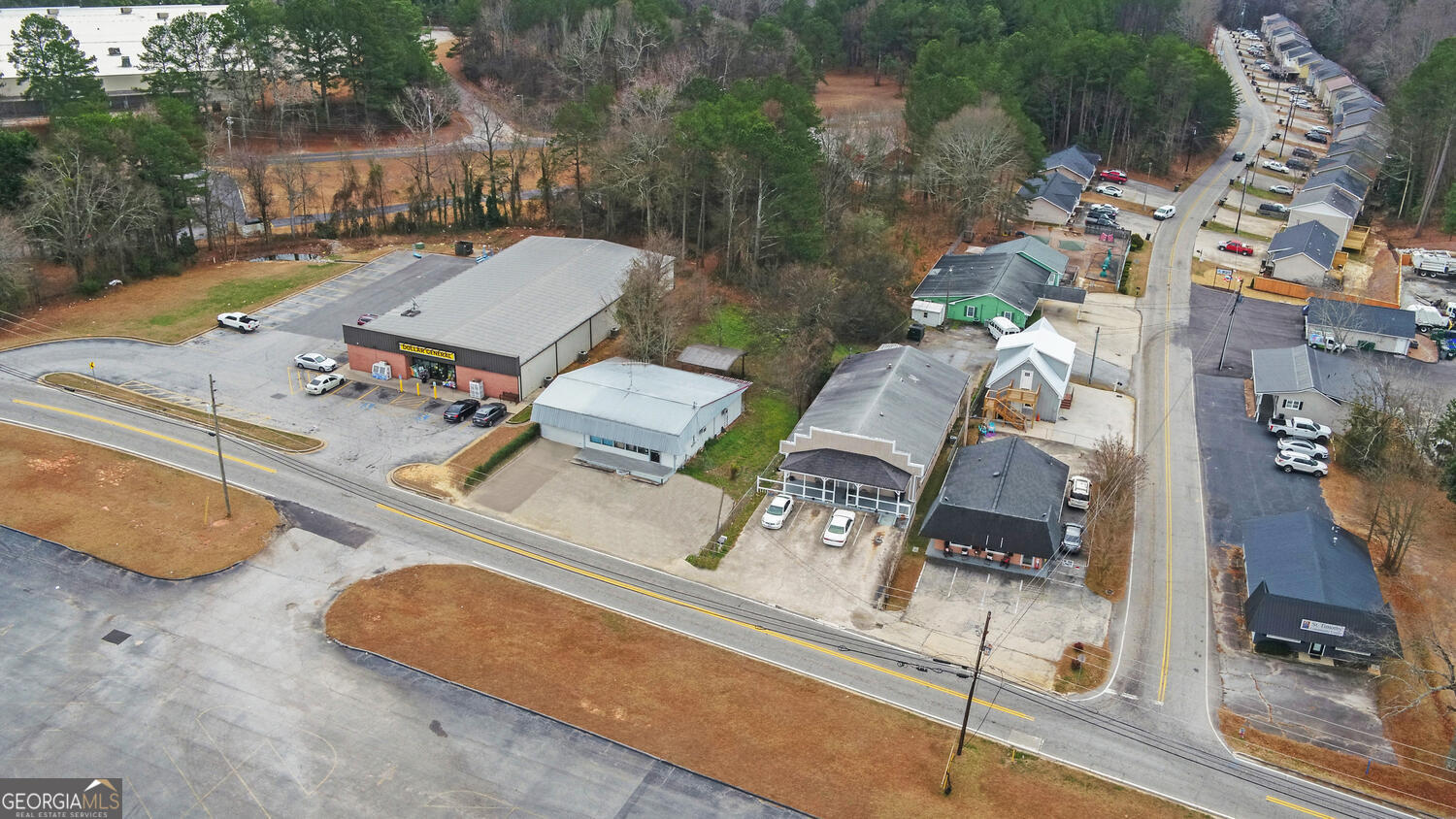 790 Collins Road Toccoa, GA 30577 - Photo 30 of 36 an aerial view of a house with pool and yard
