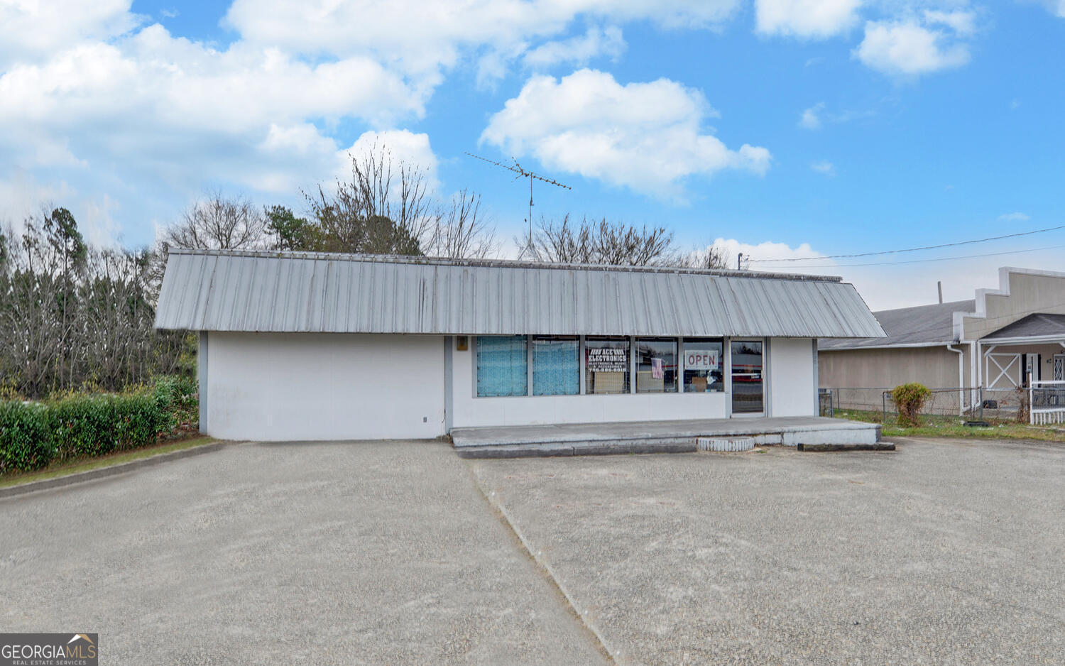 790 Collins Road Toccoa, GA 30577 - Photo 3 of 36 a front view of a house with a yard