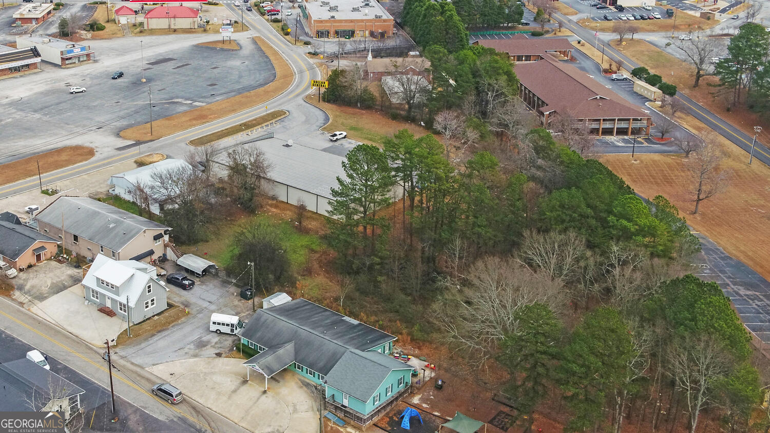 790 Collins Road Toccoa, GA 30577 - Photo 33 of 36 an aerial view of a house with a yard