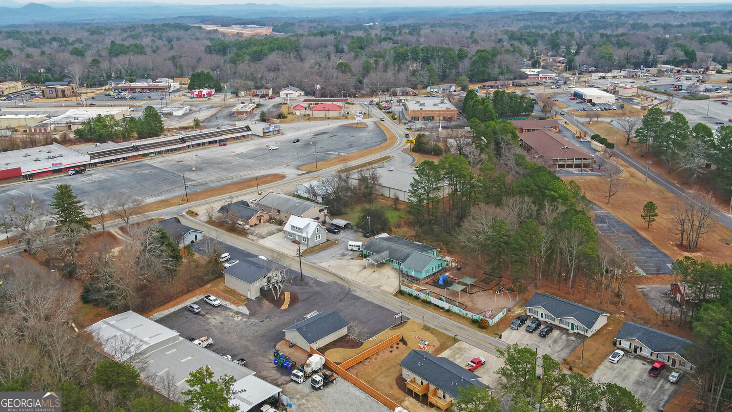 790 Collins Road Toccoa, GA 30577 - Photo 34 of 36 an aerial view of a city with lots of residential buildings