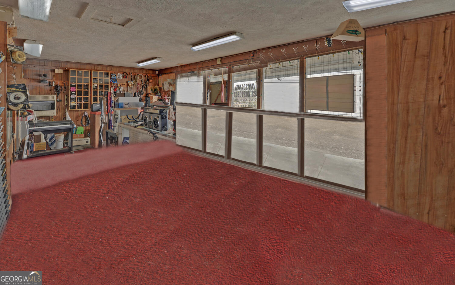 790 Collins Road Toccoa, GA 30577 - Photo 7 of 36 a view of an empty room with windows