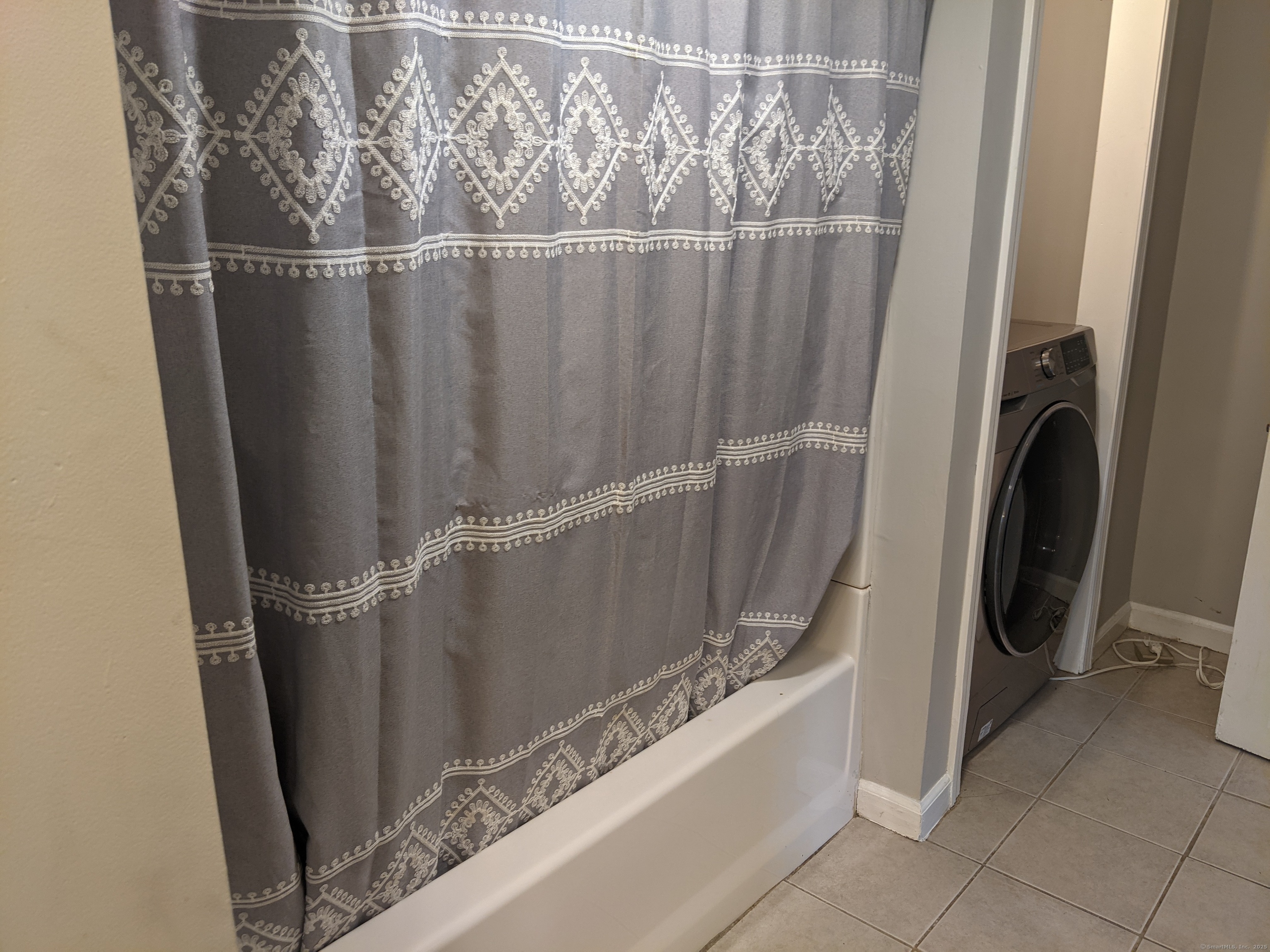 98 Water Street Derby, CT 06418 - Photo 3 of 15 a view of a storage and utility room with wooden floor
