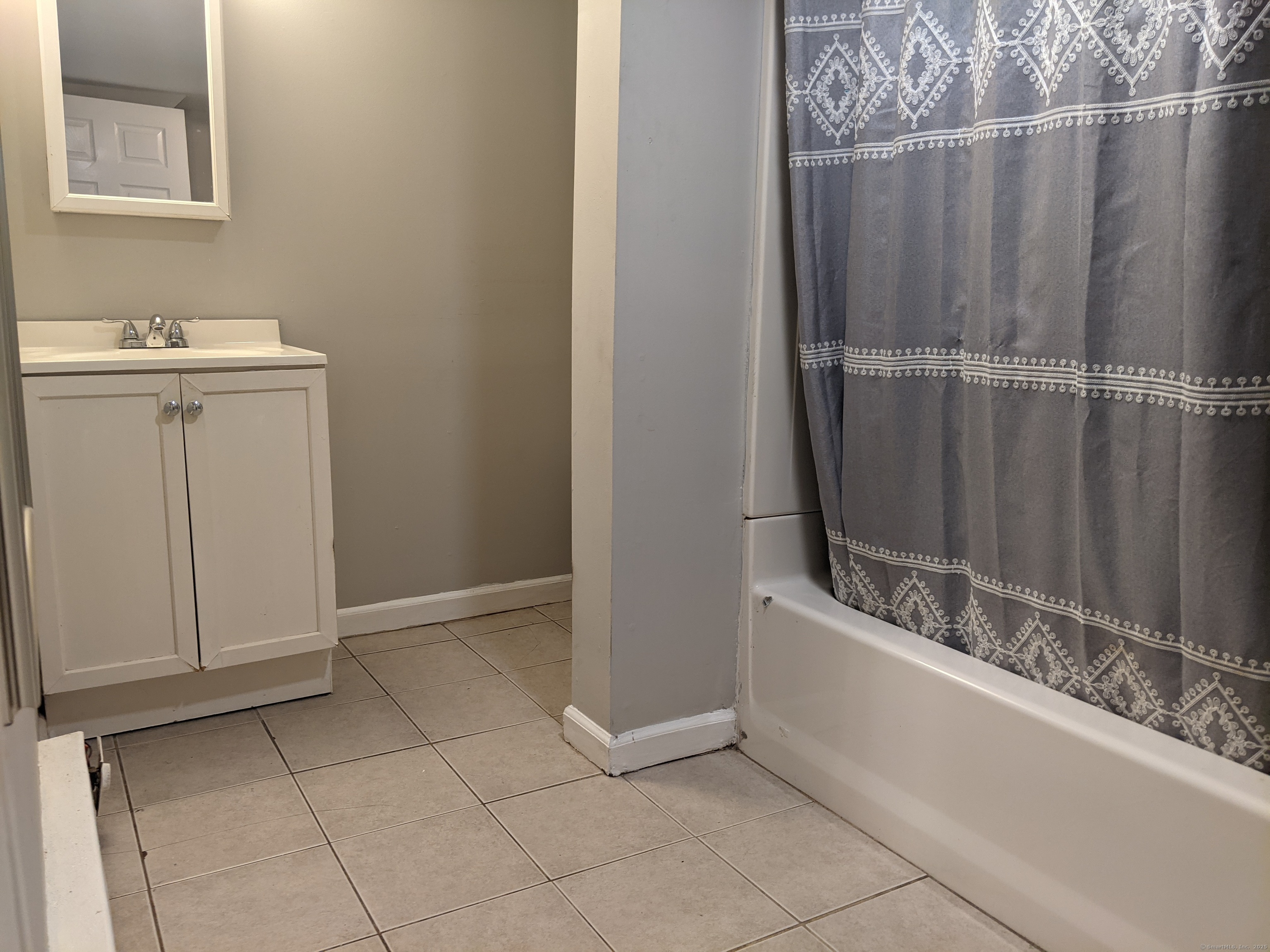 98 Water Street Derby, CT 06418 - Photo 4 of 15 a bathroom with a sink and mirror