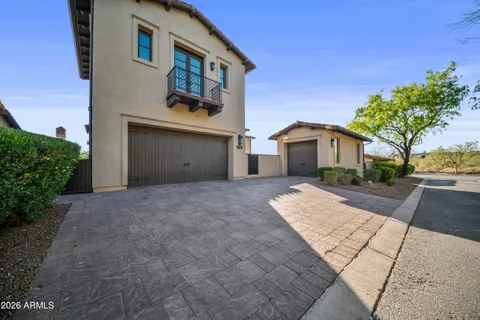 an aerial view of a house with a garden