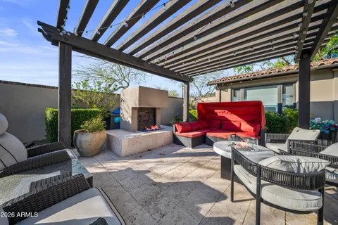 a spacious bedroom with two beds and large window