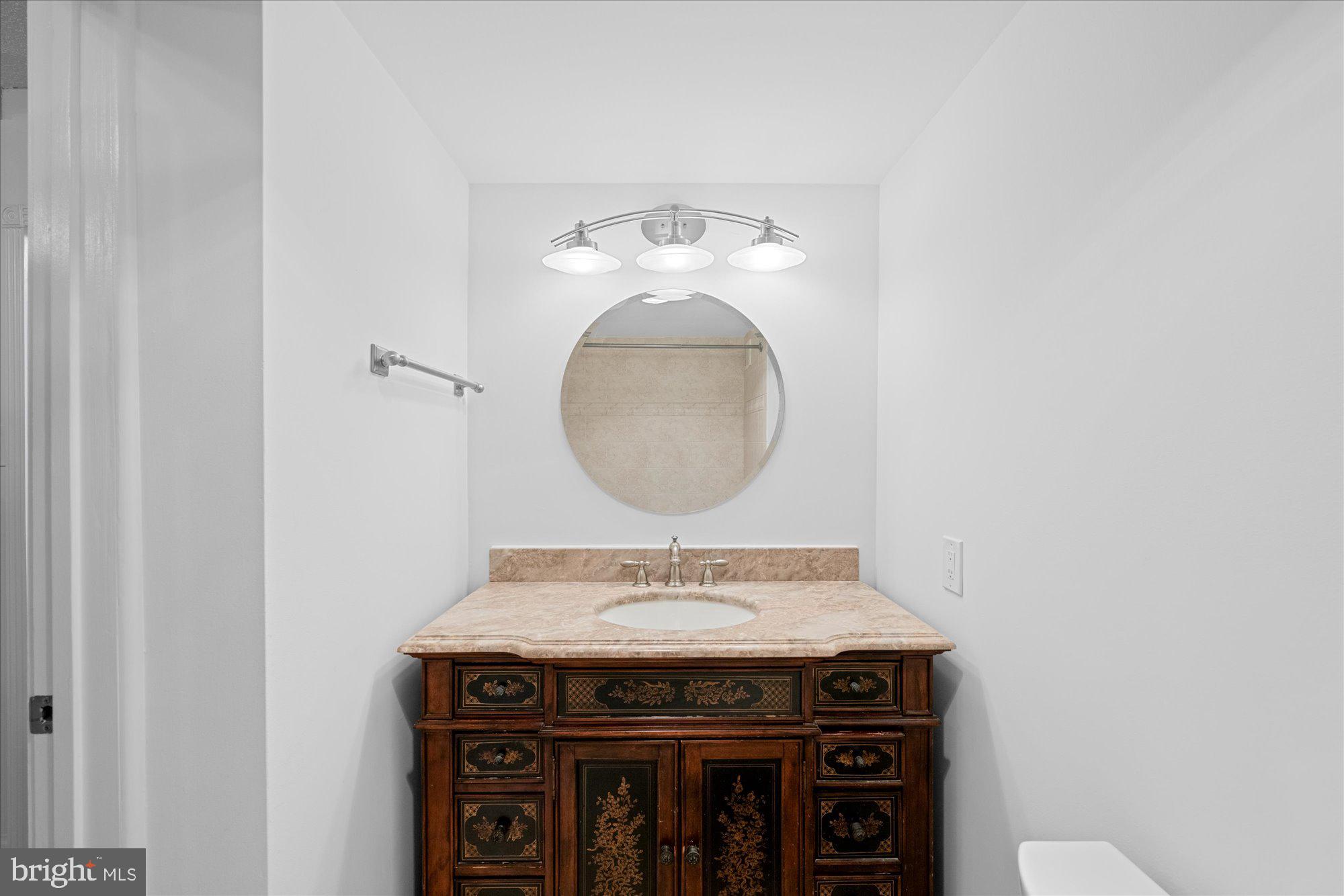 5500 Friendship Boulevard, Unit 2114N Chevy Chase, MD 20815 - Photo 11 of 19 a view of a kitchen with a sink and a stove