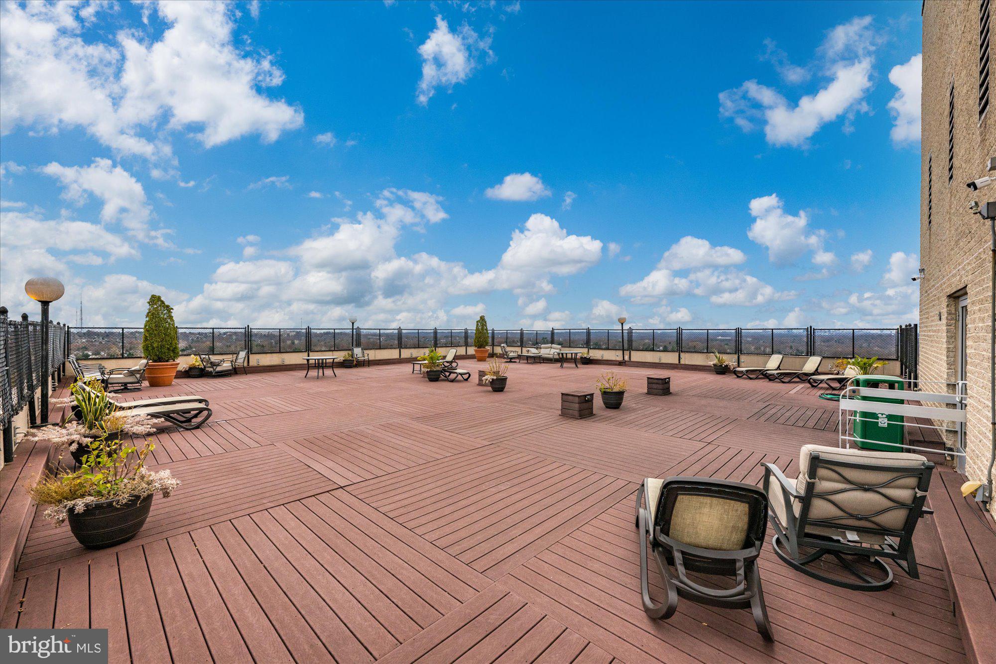 5500 Friendship Boulevard, Unit 2114N Chevy Chase, MD 20815 - Photo 18 of 19 a view of a terrace with seating space