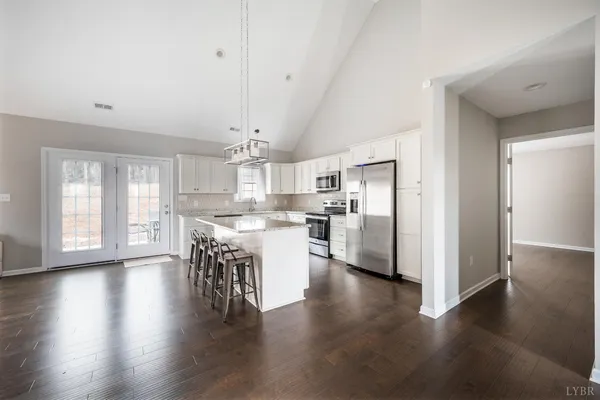 a view of kitchen with wooden floor