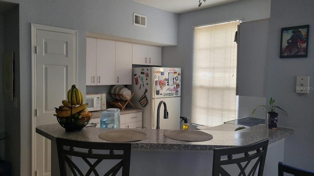 6316 Raleigh Street, Unit 401 Orlando, FL 32835 - Photo 4 of 6