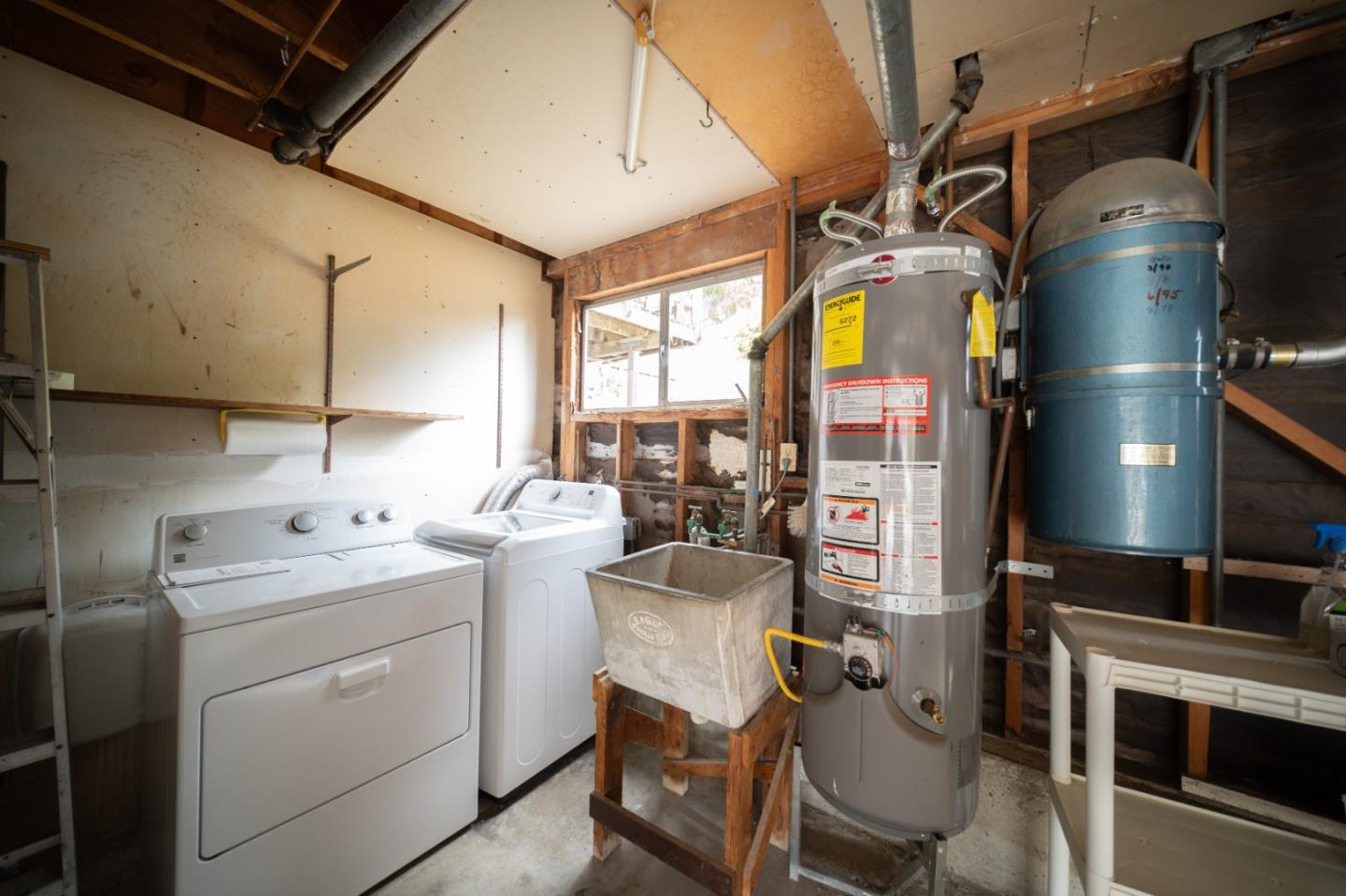 1287 Lerida Way Pacifica, CA 94044 - Photo 49 of 52 a utility room with dryer and washer