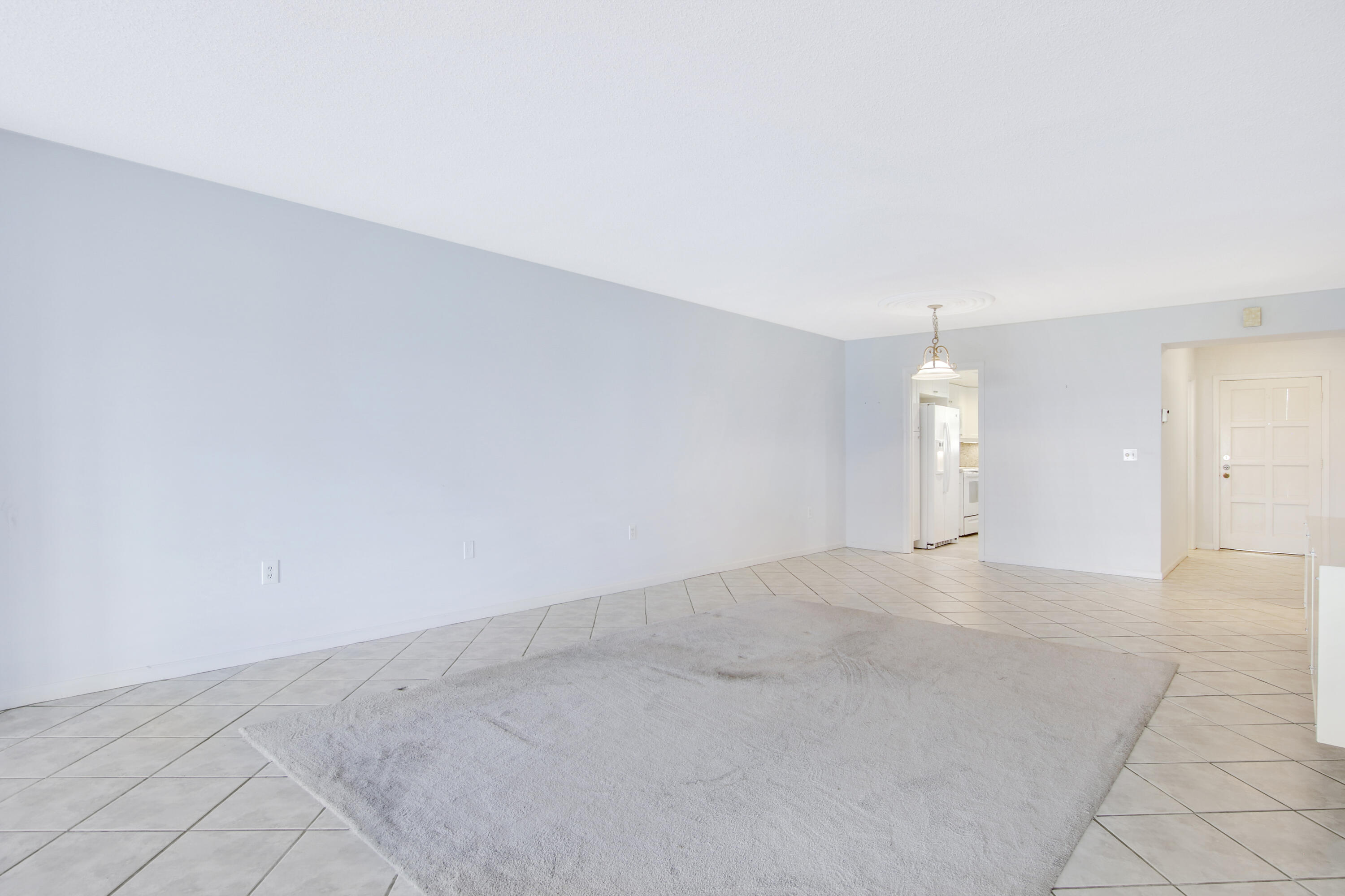 145 Atlantis Boulevard, Unit 105 Atlantis, FL 33462 - Photo 14 of 28 wooden floor in a room