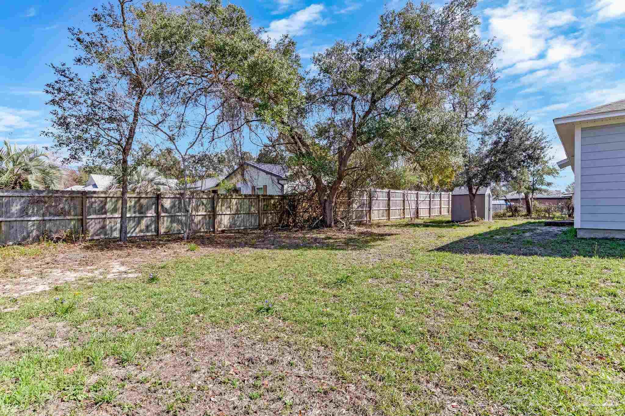 3152 Clemson Road Gulf Breeze, FL 32563 - Photo 39 of 56 a view of yard with tree s