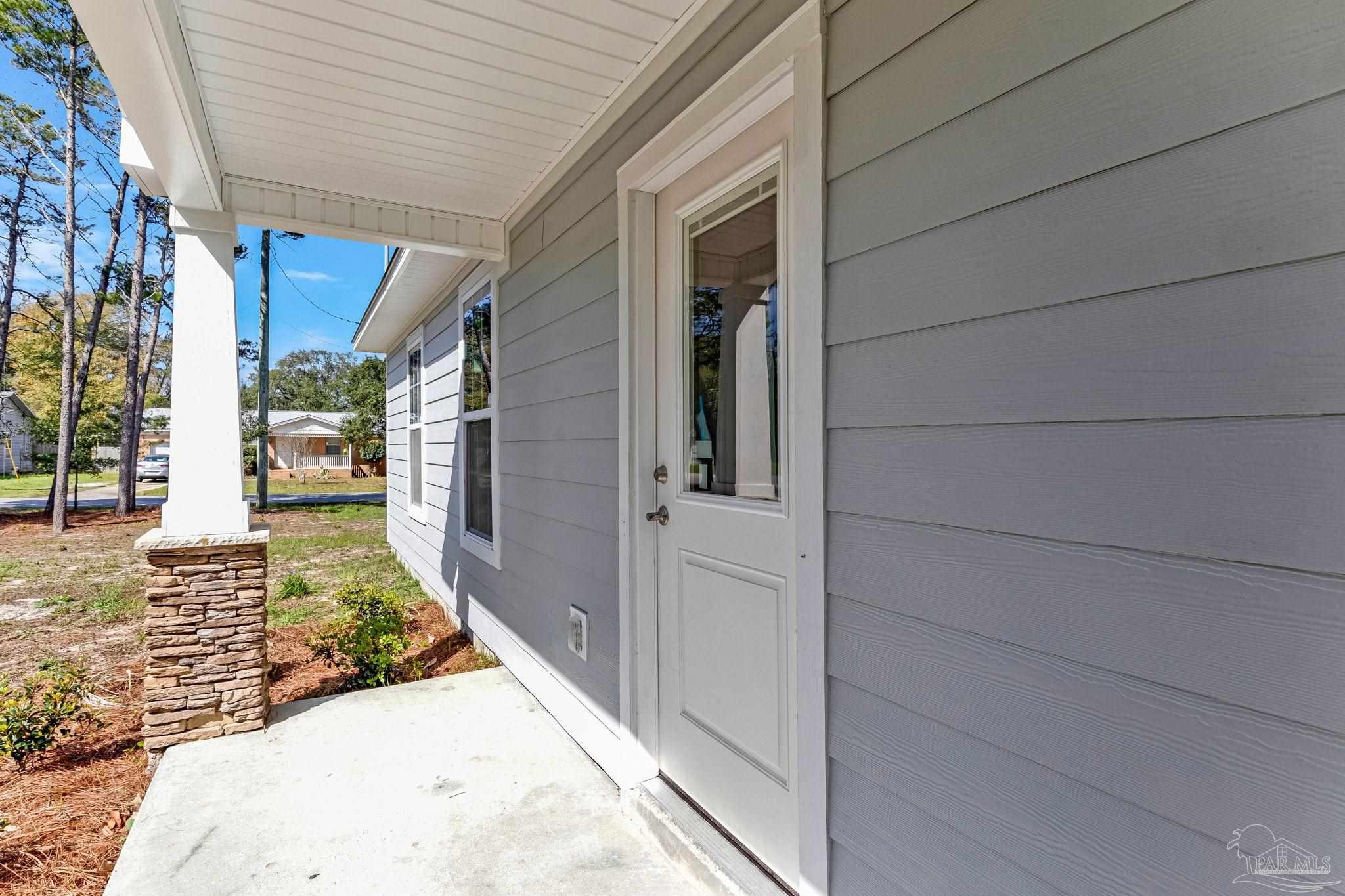 3152 Clemson Road Gulf Breeze, FL 32563 - Photo 54 of 56 a view of a entryway door of the house