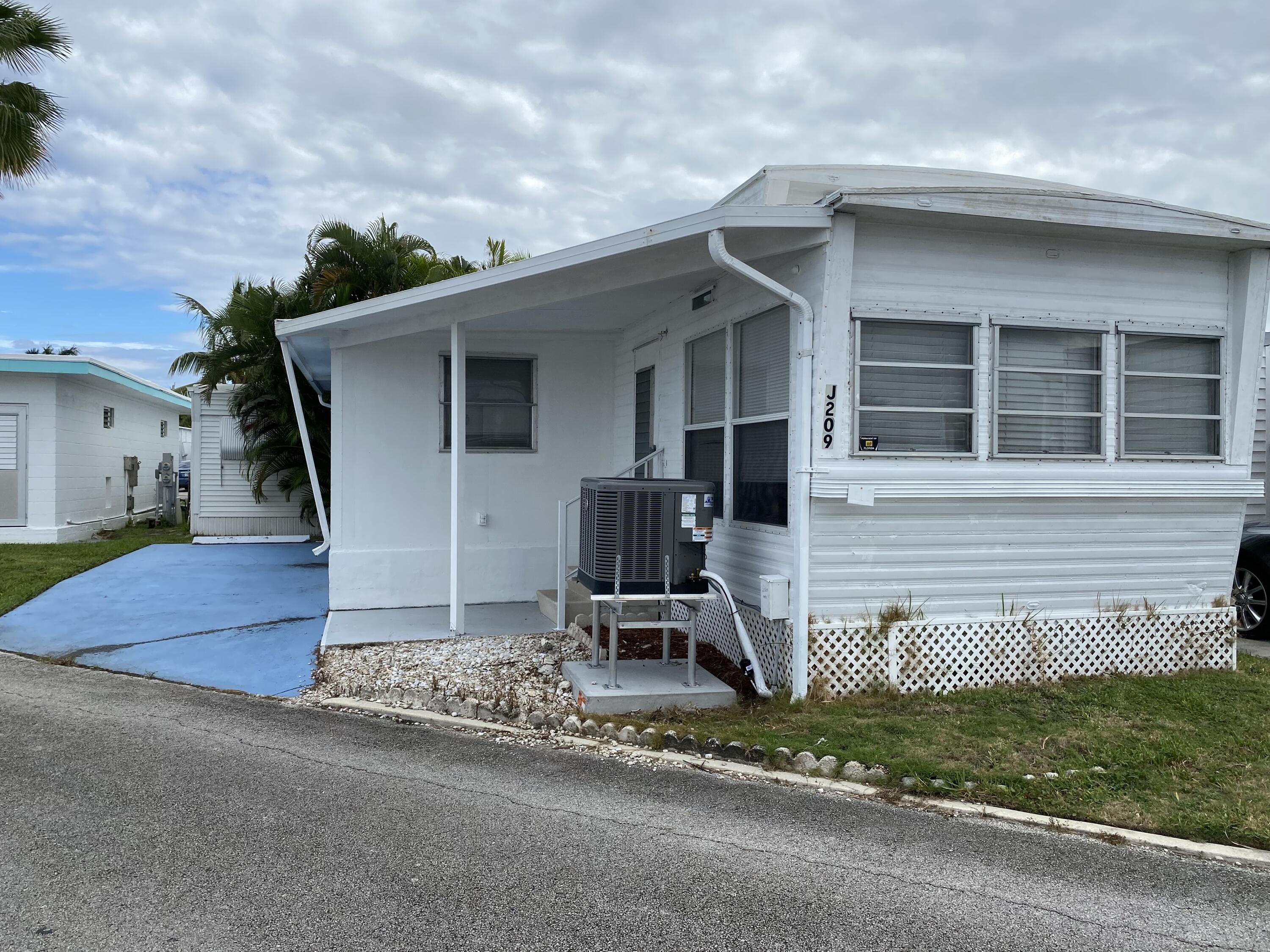 front view of a house with a street