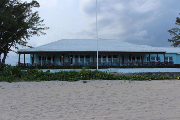 209 Java Drive, Unit J Briny Breezes, FL 33435 - Photo 6 of 11 a front view of a house with a garden
