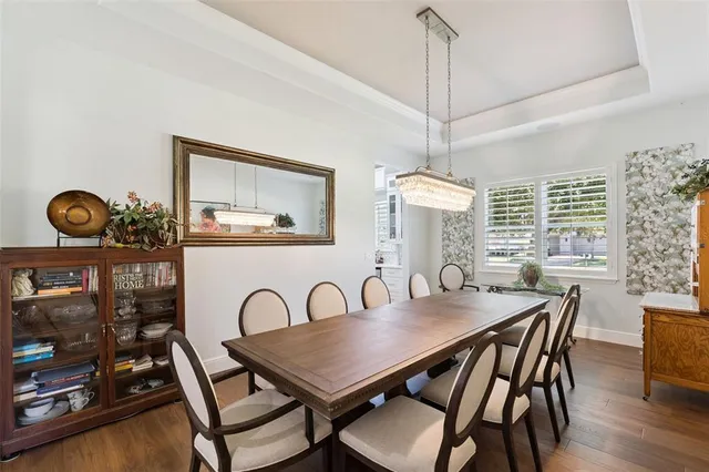 a view of a bathroom with a sink mirror and a bathtub
