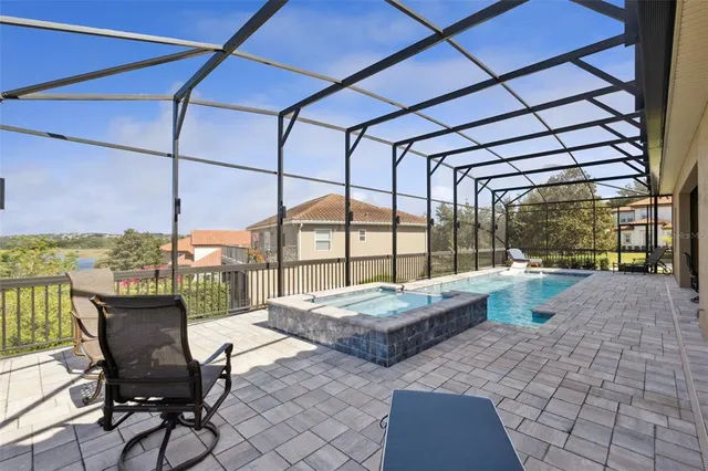 an aerial view of a houses with outdoor space and river