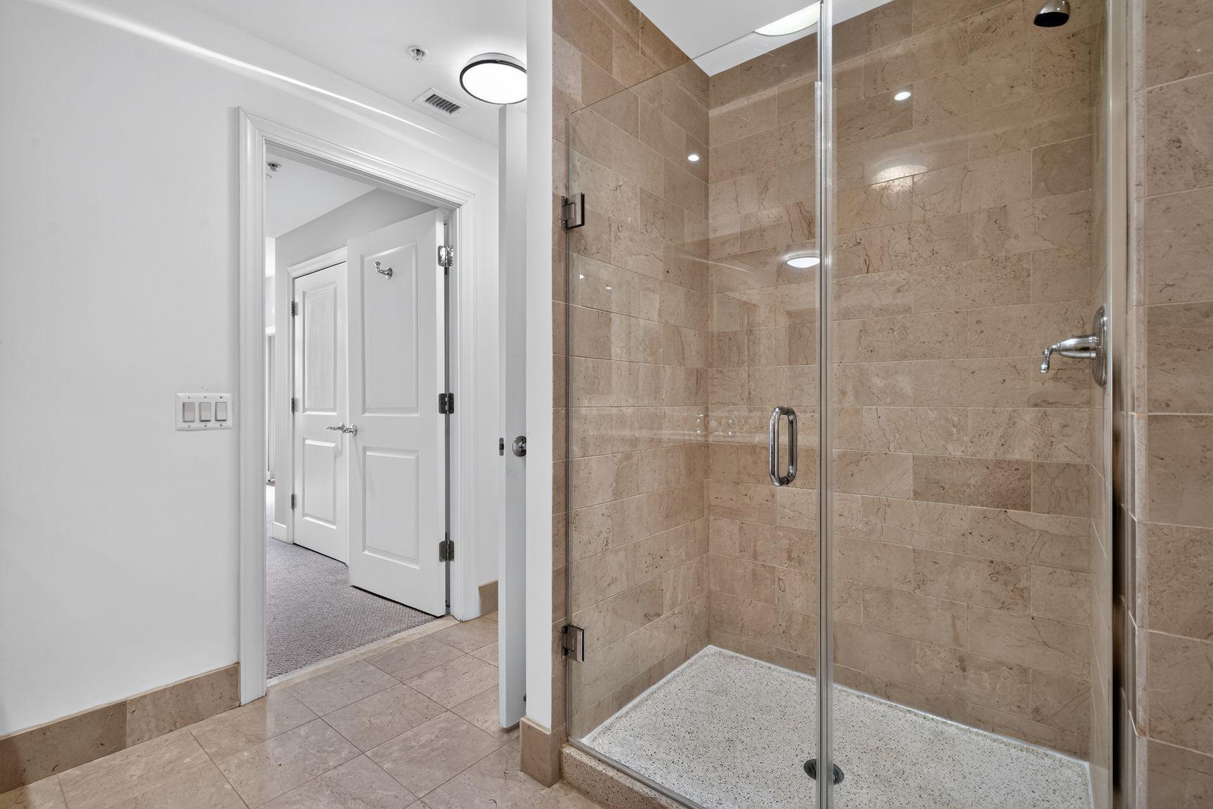 2425 L Street Northwest, Unit 421 Washington, DC 20037 - Photo 15 of 20 Spacious tiled shower.