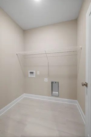 a view of a room with an empty space