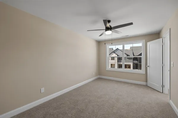 a view of workspace with furniture and window